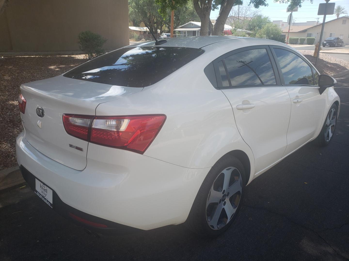 2013 Kia Rio ex (KNADN4A33D6) with an 1.6L L4 DOHC 16V engine, 6-Speed Automatic transmission, located at 323 E Dunlap Ave., Phoenix, AZ, 85020, (602) 331-9000, 33.567677, -112.069000 - 2013 Kia Rio EX,......A Must See!!... No accidents,.... Ice cold AC. The car is gorgeous inside and out. Power windows, Power door locks, Stereo/ CD Player, Phone sync, Bluetooth, Backup camera, Satellite compatible, navigation, Beautiful Black interior with Black leather seats in near perfect condi - Photo#3